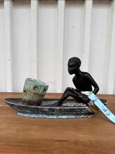 Beeld man in kano lamp  antiek