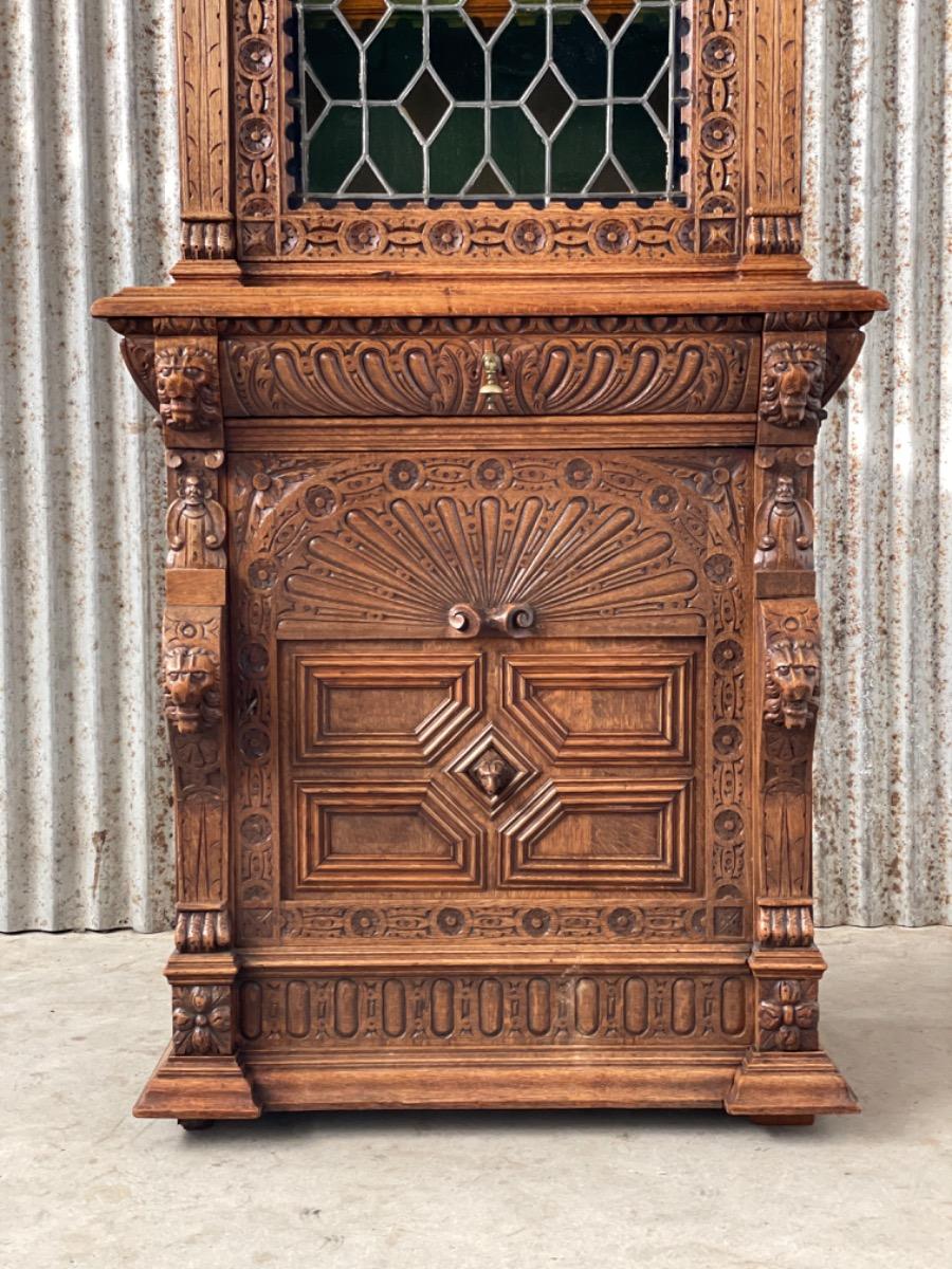 Antique oak cabinet with stained glass 