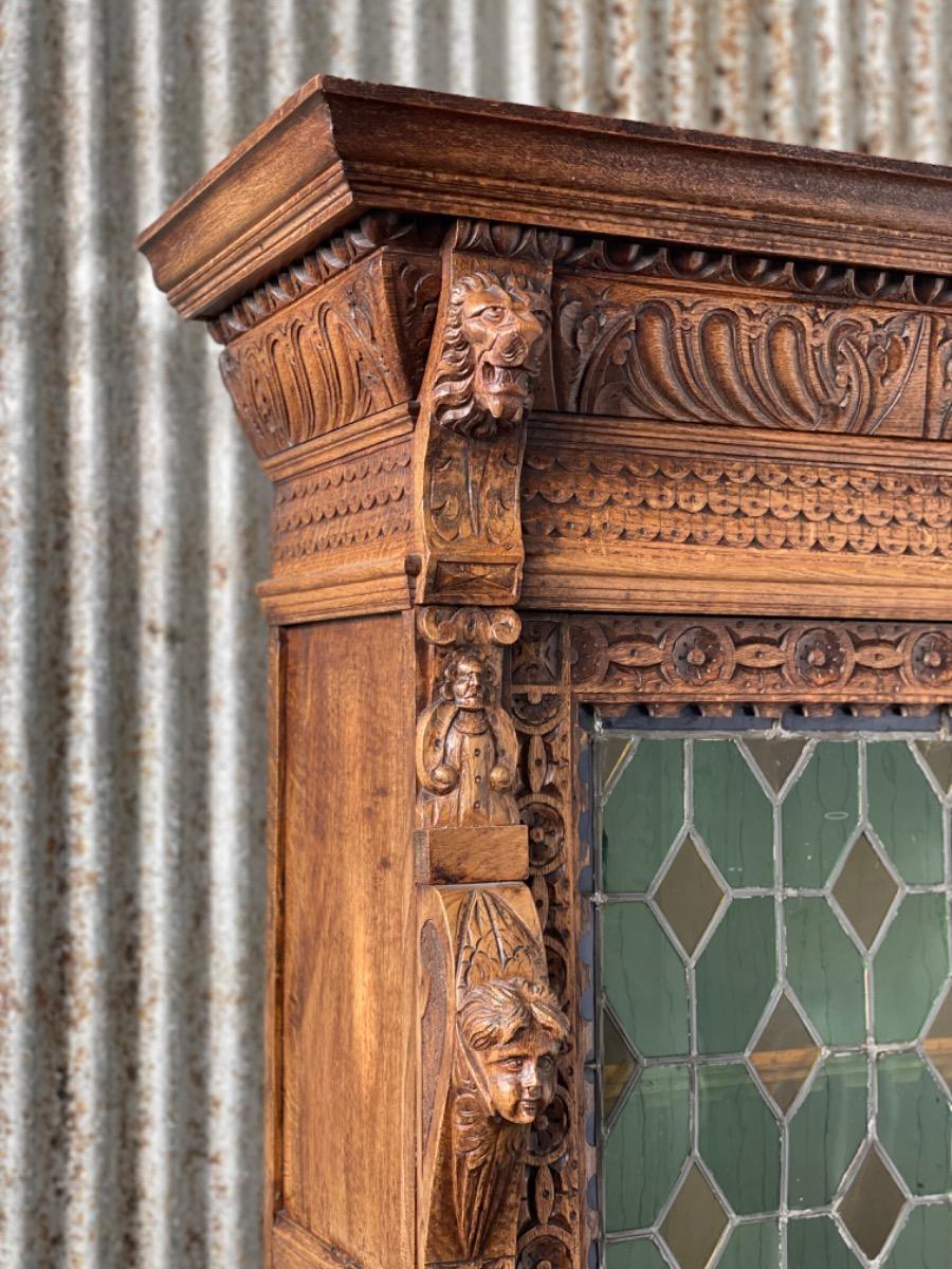 Antique oak cabinet with stained glass 