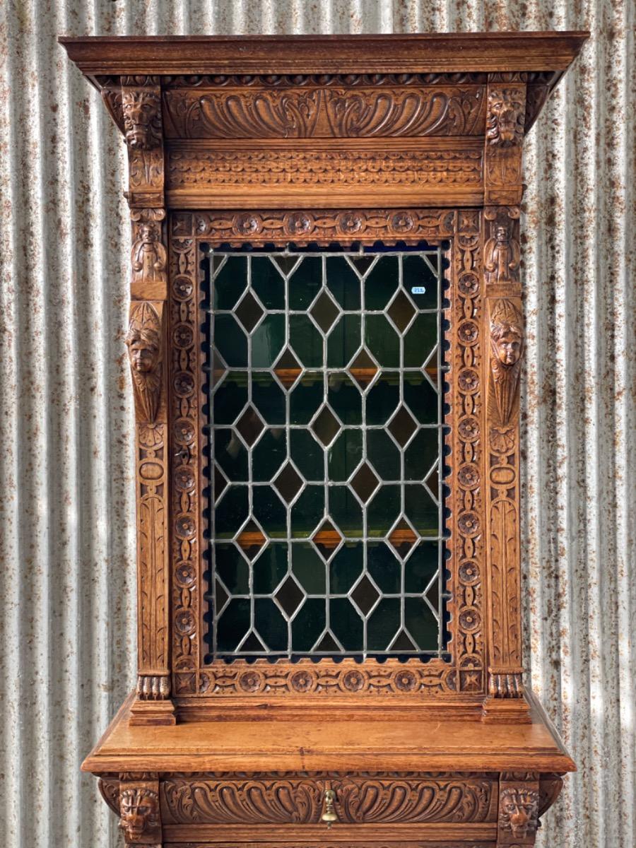 Antique oak cabinet with stained glass 