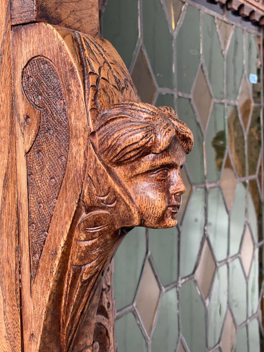 Antique oak cabinet with stained glass 