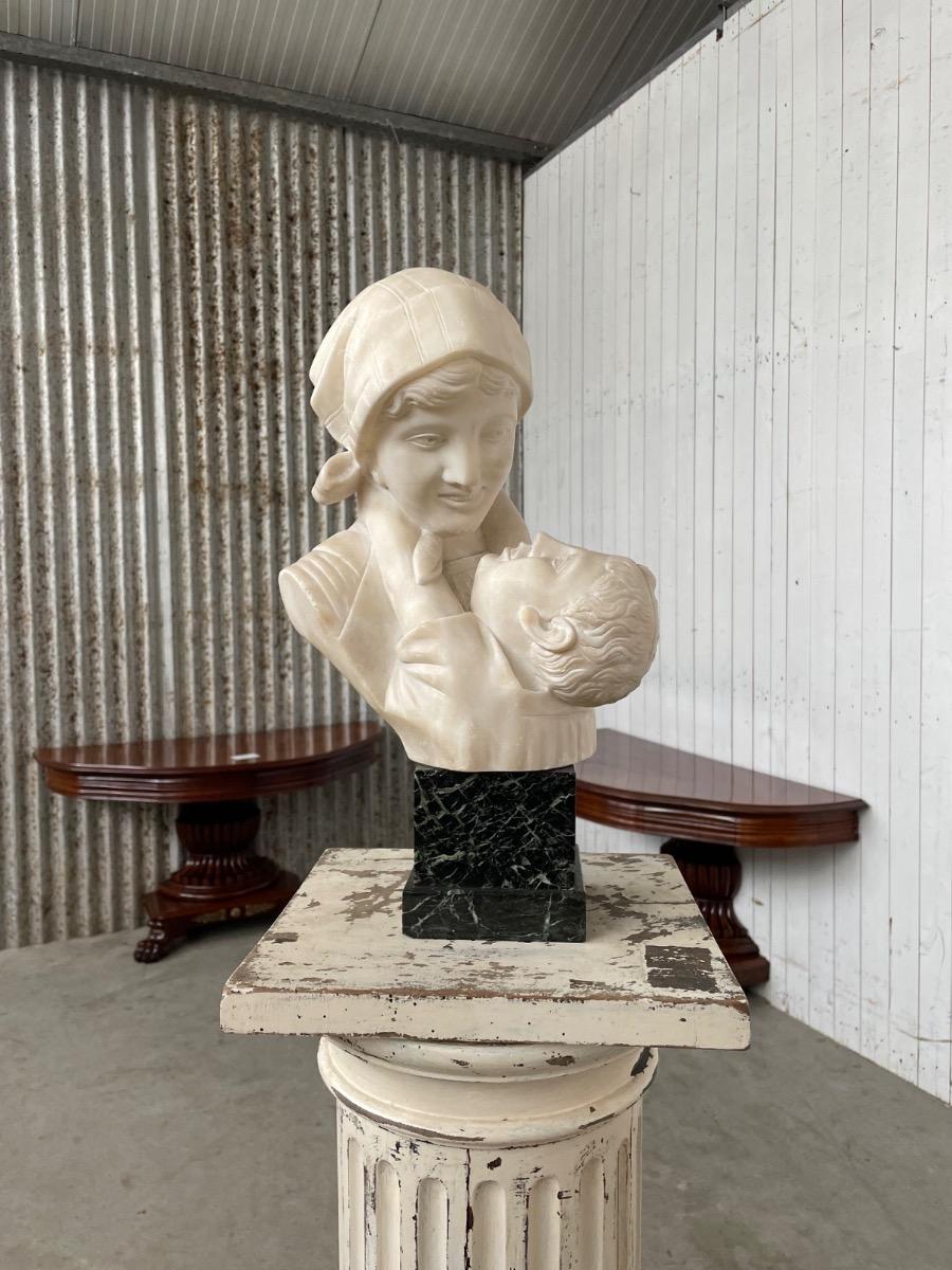 Antique Women with child sculpture