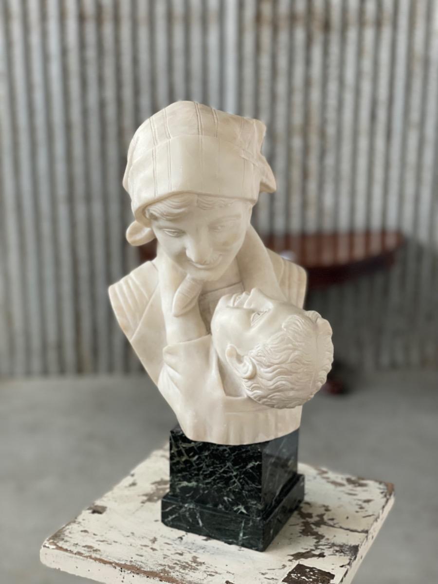 Antique Women with child sculpture