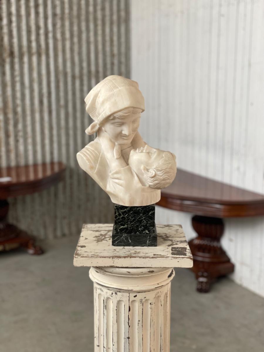 Antique Women with child sculpture