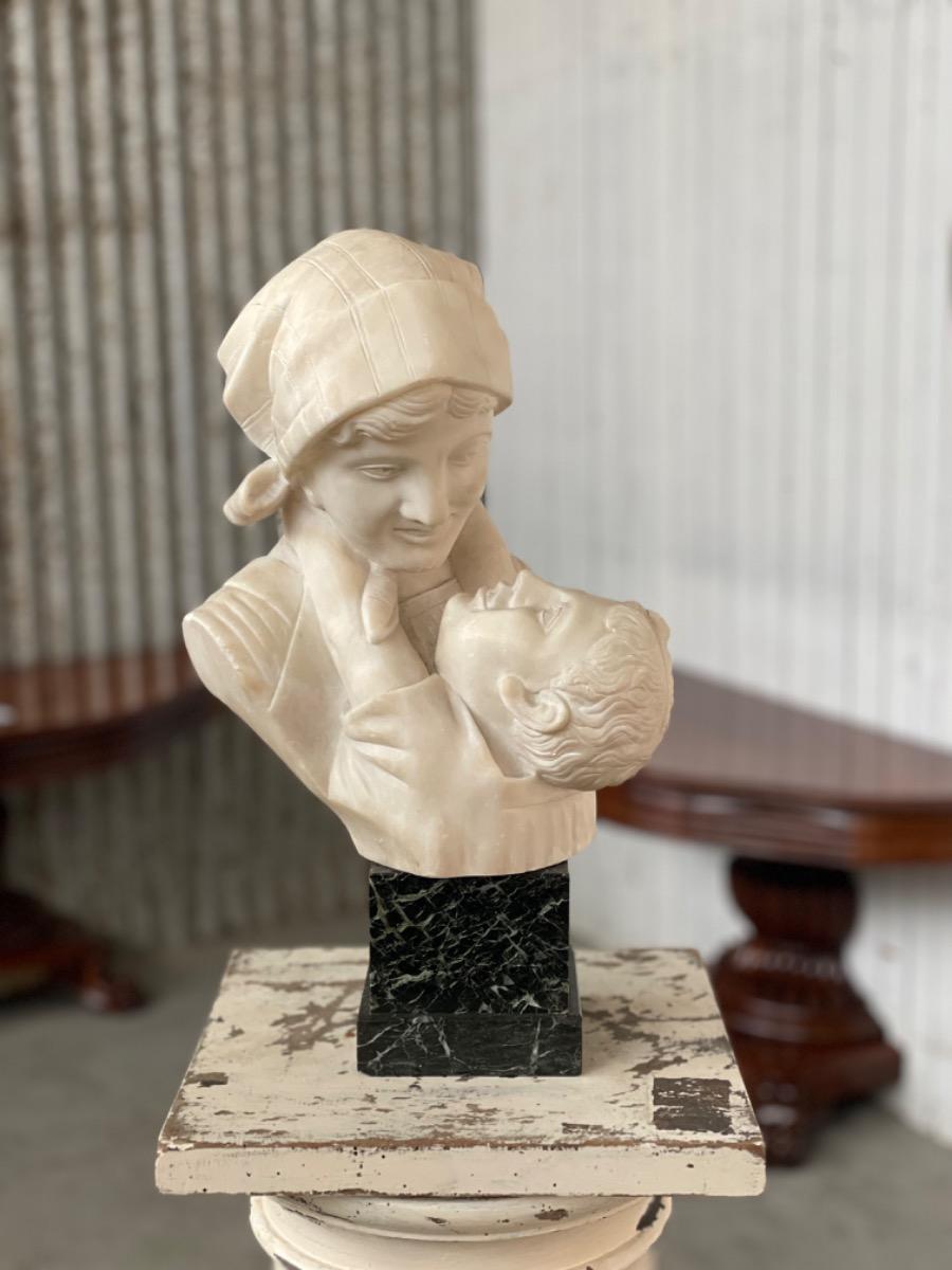 Antique Women with child sculpture