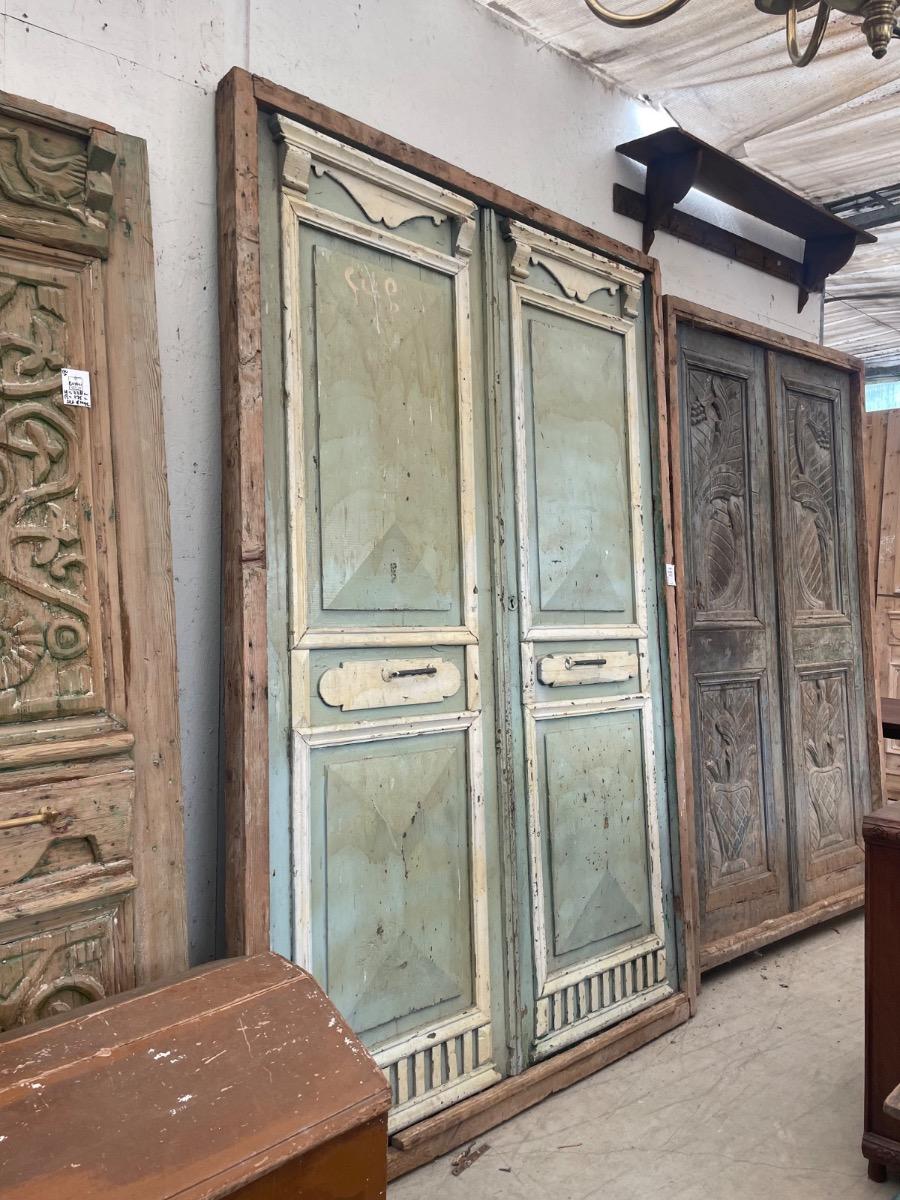 Green Antique door in frame