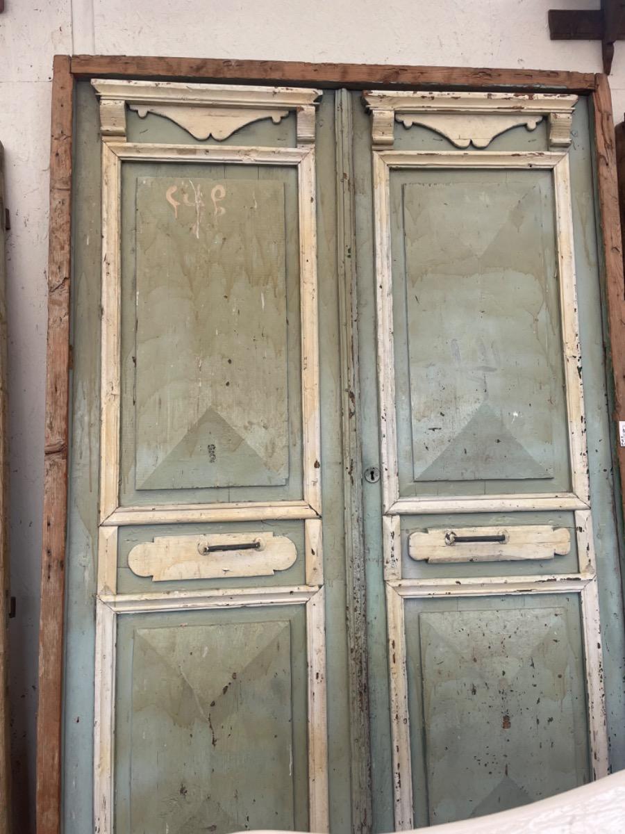 Green Antique door in frame