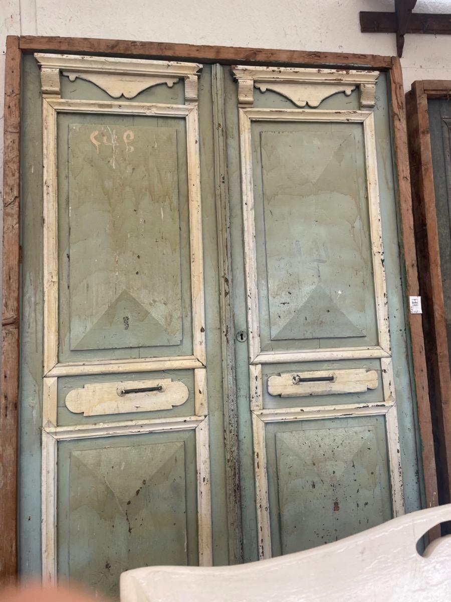 Green Antique door in frame